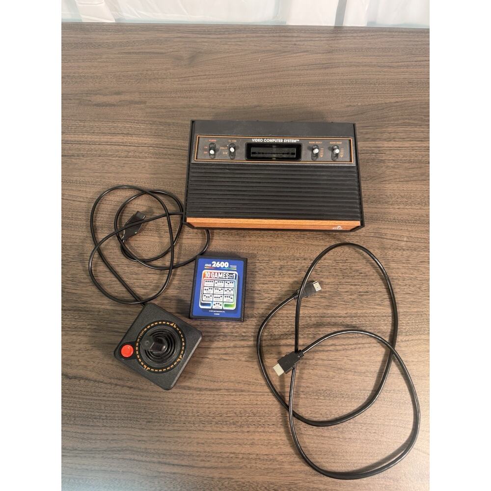 atari 2600 console with joystick, cables‎ and one cartridge with 10 game working